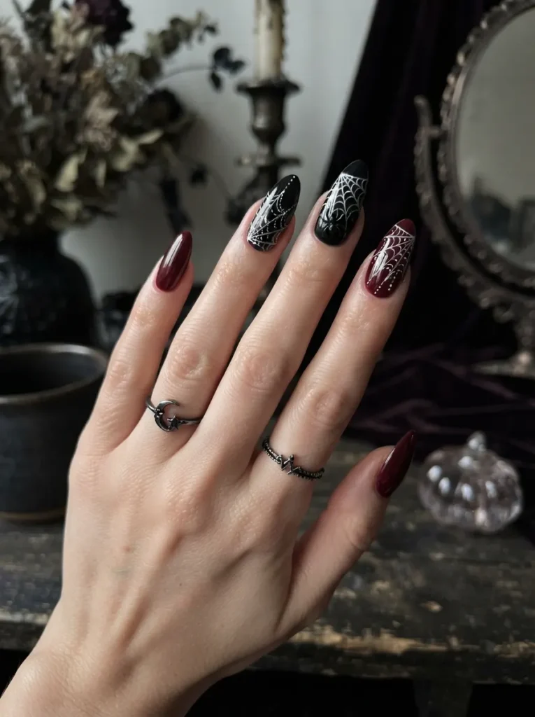 ![Cute Halloween pumpkin nail art with miniature orange pumpkins, green stems, warm cream and black base colors, glossy finish, autumn-inspired manicure, vertical Pinterest photography.]
