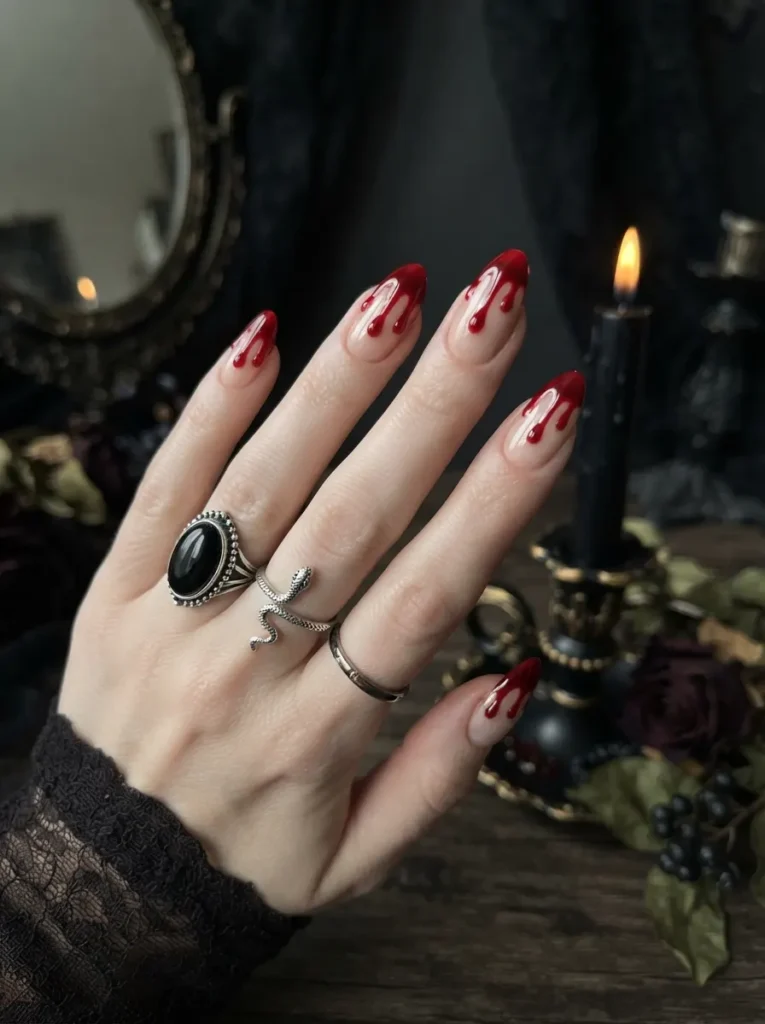 ![Cute Halloween manicure with black cat faces, pointed ears, tiny whiskers, yellow eyes, and neutral accent nails, playful spooky nail art, vertical Pinterest photography.]